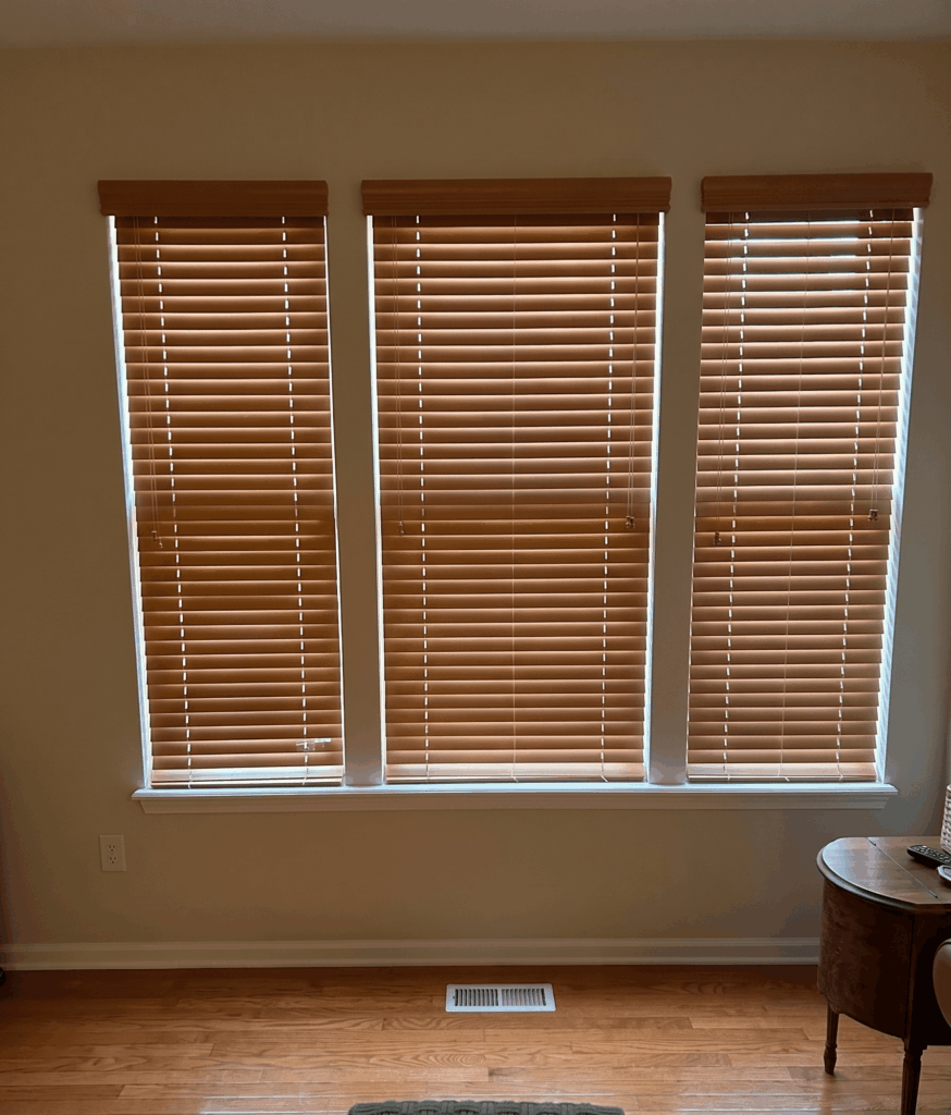 InStyle Blinds IN - A window is shown with real wood blinds. 